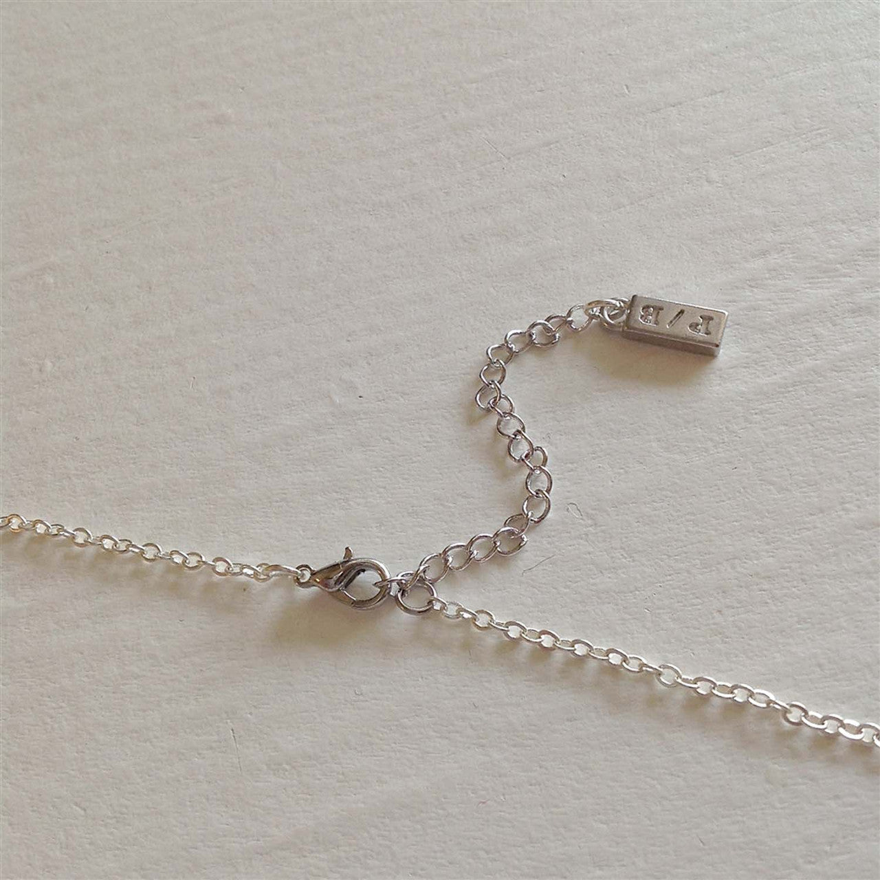 Dire Straits Salty Language Charm Necklace - Silver