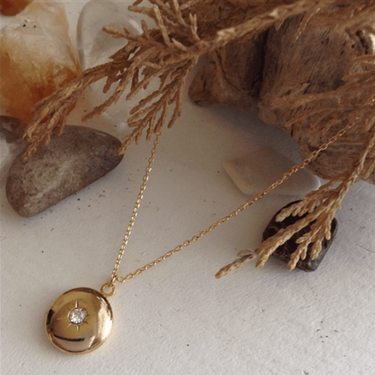 Antares Round Rhinestone Locket Necklace In Gold