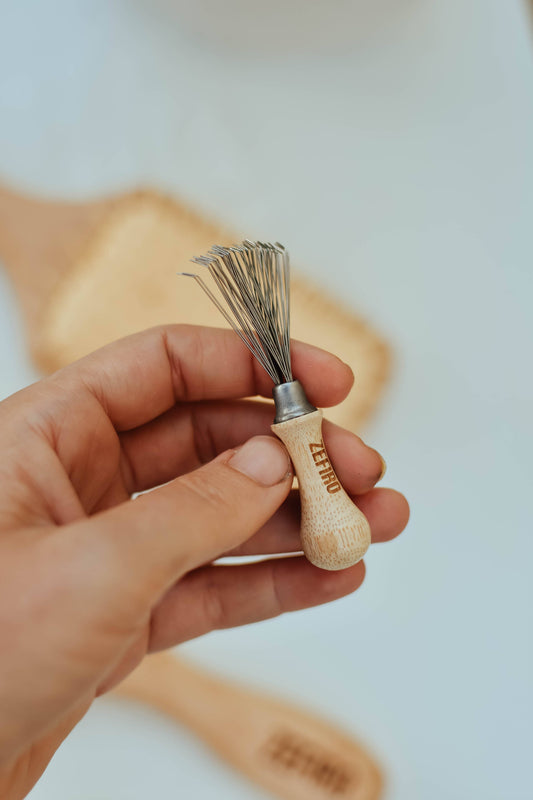 Hairbrush cleaning tool